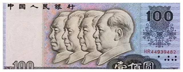 第五套人民币人物设定为毛泽东和周恩来，朱总理批复全部为毛泽东